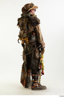  Ryan Miles in Junk Town Postapocalyptic Bobby Suit holding gun standing whole body 0006.jpg